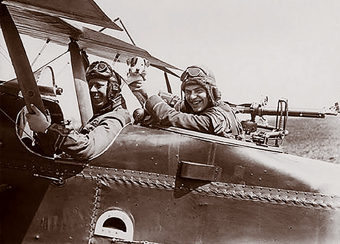 These two Royal Flying Corps lads are delighted to show off their almost cartoon-like Jack Russell before setting out on a mission over German lines.